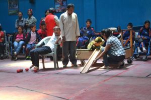 Amir Bomjom, a physically disabled person is enjoying the game of boccia.
